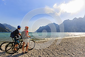 Mountain biking couple on Lake Garda.