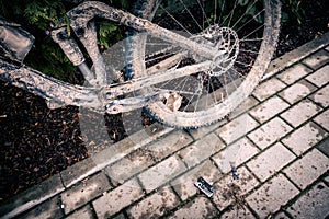Mountain biking, dirty and broken bicycle closeup