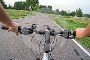 Mountain biking down hill descending fast on bicycle.