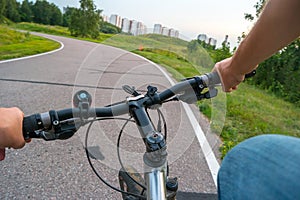 Mountain biking down hill descending fast on bicycle.