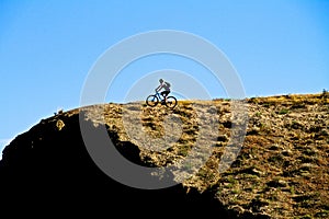 Mountain Biking Near a Cliff