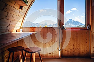 Mountain bivouac free sleeping shelter in the piedmontese alps Italy, facing the Mount Viso