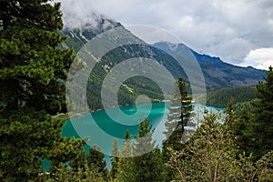 Mountain blue lake Morskie Oko Poland. Blue lake with cloudy sky