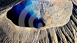 Mountain Bromo active volcano crater in East Jawa, Indonesia. Top view from drone fly. 4K footage