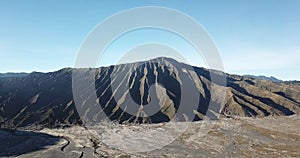 Mountain Bromo active volcano crater in East Jawa, Indonesia. Top view from drone fly. 4K footage