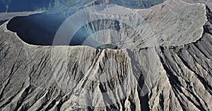 Mountain Bromo active volcano crater in East Jawa, Indonesia. Top view from drone fly. 4K footage