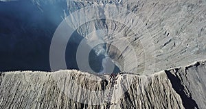 Mountain Bromo active volcano crater in East Jawa, Indonesia. Top view from drone fly. 4K footage