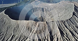 Mountain Bromo active volcano crater in East Jawa, Indonesia. Top view from drone fly. 4K footage