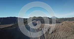 Mountain Bromo active volcano crater in East Jawa, Indonesia. Top view from drone fly. 4K footage