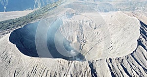 Mountain Bromo active volcano crater in East Jawa, Indonesia. Top view from drone fly. 4K footage