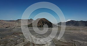 Mountain Bromo active volcano crater in East Jawa, Indonesia. Top view from drone fly. 4K footage