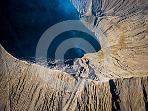 Mountain Bromo active volcano crater in East Jawa, Indonesia. Top view from drone fly