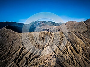 Mountain Bromo active volcano crater in East Jawa, Indonesia. Top view from drone fly