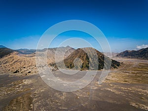 Mountain Bromo active volcano crater in East Jawa, Indonesia. Top view from drone fly