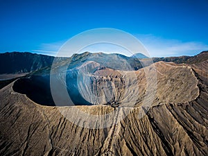 Mountain Bromo active volcano crater in East Jawa, Indonesia. Top view from drone fly