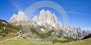 Mountain Cadini Group with cottage Rifugio Citta di Carpi, Dolomites in South Tyrol