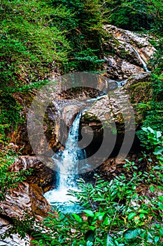 Mountain cascade waterfall. Eastern Abkhazia. Near the town of Tkvarcheli. Akarmara District