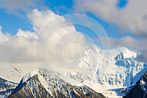 mountain chain in dense clouds