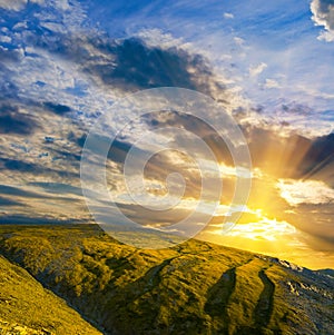 mountain chain silhouette at the sunset