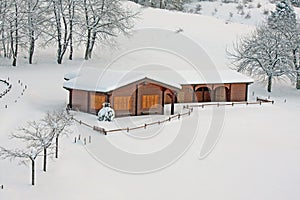 Mountain chalet in the Alps in Italy photo