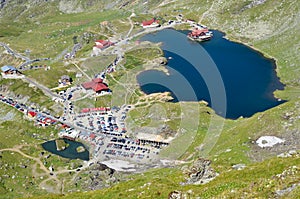 Mountain chalet on glacial lake photo