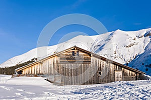 A mountain chalet in the Mont Blanc massif Between Mont Joly and Aiguille Croche in Europe, France, Rhone Alpes, Savoie, Alps, in photo
