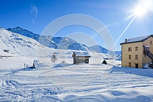 Mountain chalet in snow