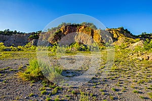 Mountain cliffs and flat terrain photo