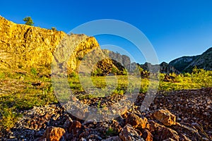 Mountain cliffs and flat terrain photo