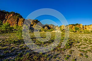 Mountain cliffs and flat terrain photo