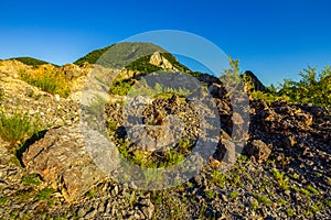 Mountain rocks and rugged terrain photo