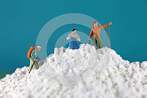 Mountain climber figures on flour