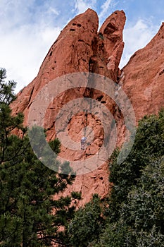 Mountain climber rock climbing at garden of the gods colorado springs rocky mountains