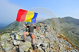 Mountain climber on top - Peleaga peak, Retezat