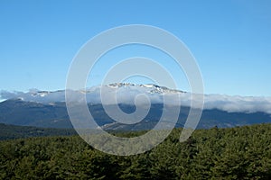 Mountain with clouds and snow