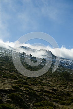 Mountain with clouds and snow