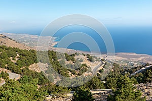 Mountain coast with serpentine roads at southern part of Crete island, Greece