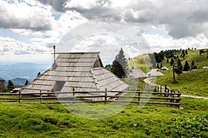 Mountain cottage hut or house on idyllic hill Velika Planina
