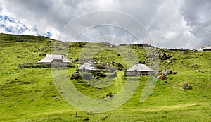 Mountain cottage hut or house on idyllic hill Velika Planina