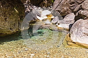 Mountain creek through Samaria gorge, island of Crete