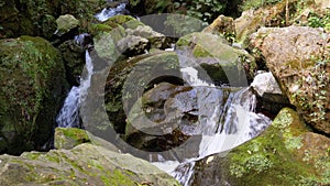 Mountain Creek. Water moves down through Rocks in the Mountains