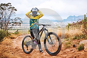 Mountain cyclist, bike and sports person on a outdoor nature road for a ride or sport race. Bicycle helmet, fitness and