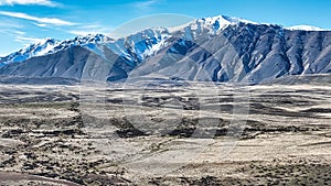 Mountain and farming country views of the shores of Lake Tekapo area near Roundhill Ski area