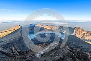 Mountain forest landscape under sunrise sky with clouds