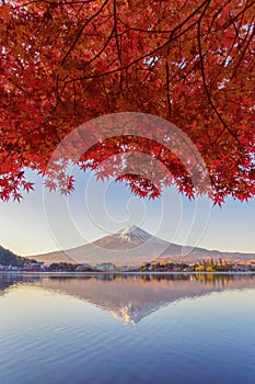 Mountain Fuji with red maple leaves or fall foliage in colorful autumn season near Fujikawaguchiko, Yamanashi. Five lakes. Trees