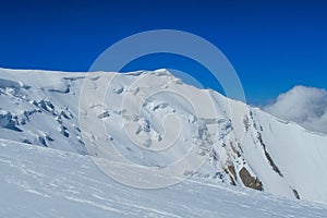 Mountain glacier on high snow peak