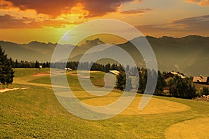 Mountain golf course in crans-montana photo