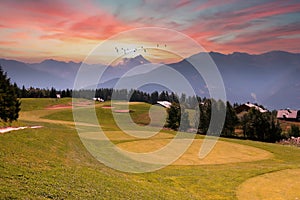 Mountain golf course in crans-montana photo