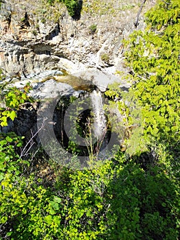 Mountain gorge with a small waterfall