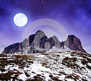 Mountain group Sassolungo Langkofel in the night. South Tyrol, Italy.